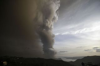 Taal Volcano spews ash as it erupts Sunday Jan. 12, 2020, in Tagayta.
