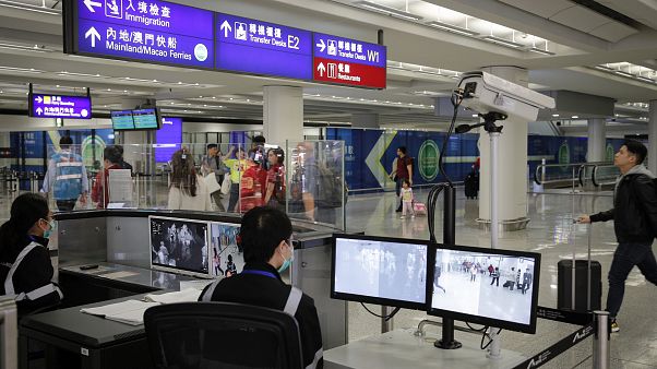 Havaalanlarında yolcular termal kameralarla kontrol ediliyor, Hong Kong Havaalanlarında yolcular termal kameralarla kontrol ediliyor, Hong Kong