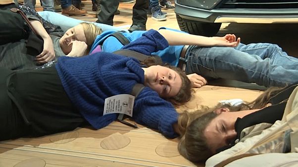 Extinction Rebellion climate activists disrupt Brussels motor show Extinction Rebellion climate activists disrupt Brussels motor show