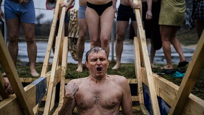 Russians mark Epiphany with plunge into icy water
