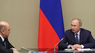 Rusya Devlet Başkanı Vladimir Putin ülkenin yeni Başbakanı Mihail Mişustin ile birlikte.