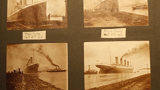 Photos of the Titanic from a family album displayed at the Transport museum in Belfast, Northern Ireland, UK, October 2014.