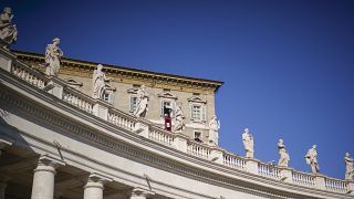 Pope Francis delivers his blessing as he recites the Angelus noon prayer from the window of his studio overlooking St.Peter’s Square, at the Vatican,  Sunday, Jan. 12, 2020. 