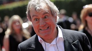 In this Saturday, Aug. 21, 2010 file photo, Terry Jones arrives at the Creative Arts Emmy Awards in Los Angeles.
