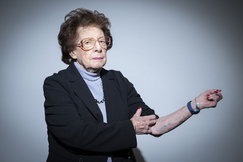 A reminder of lifelong suffering: Auschwitz survivors show identifying  tattoos | Euronews
