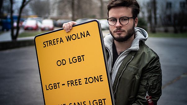 Bart Staszewski with a "LGBT-FREE ZONE" sign he created for his campaign. Bart Staszewski with a "LGBT-FREE ZONE" sign he created for his campaign.