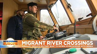 Hungary launches armed river patrols to catch swimming migrants