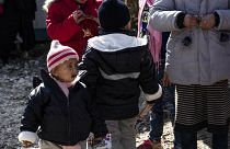Orphans, from various nationalities including two French (L, 2-L) gather at the Kurdish-run al-Hol camp. January 25, 2020