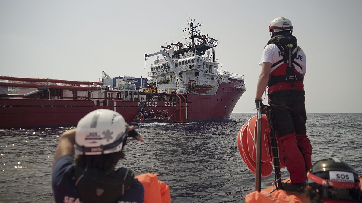 A rescuer waits for orders from the Ocean Viking in the Mediterranean Sea, Tuesday, Sept. 17, 2019. 