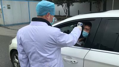 Coronavirus chinois : le bilan s'alourdit, les barrières se renforcent