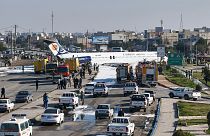 Plane overshoots runway, skids into street in Iran