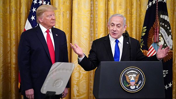Israeli Prime Minister Benjamin Netanyahu, with US President Donald Trump, speaks during an announcement of Trump's Middle East peace plan in White House on January 28, 2020 Israeli Prime Minister Benjamin Netanyahu, with US President Donald Trump, speaks during an announcement of Trump's Middle East peace plan in White House on January 28, 2020