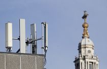 Mobile network phone masts are visible in front of St Paul's Cathedral in the City of London, Tuesday, Jan. 28, 2020