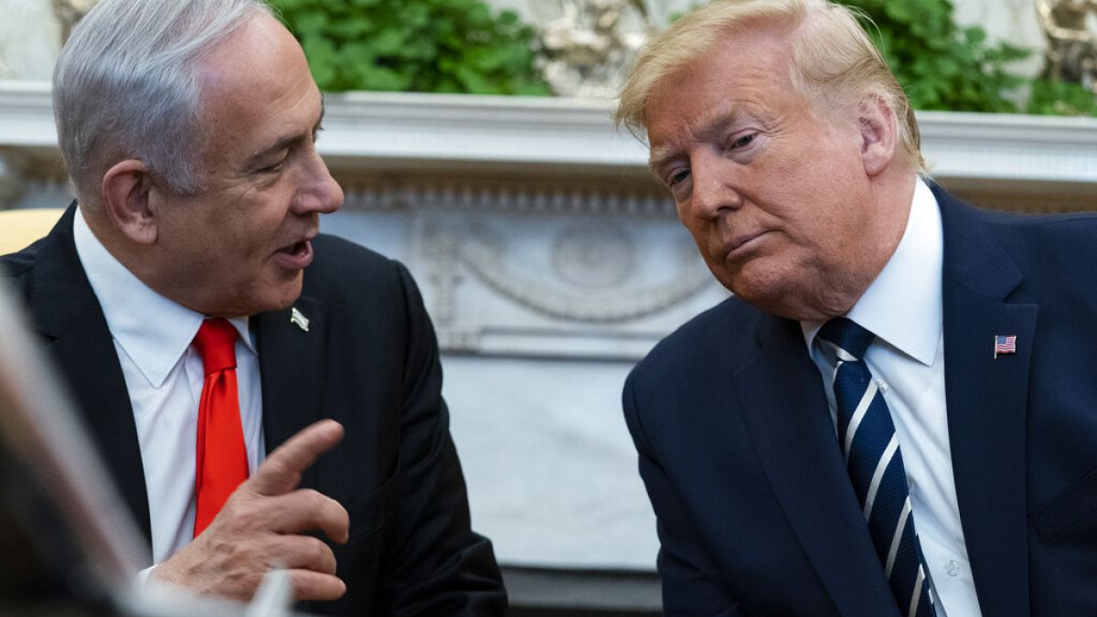 President Donald Trump listens to Israeli Prime Minister Benjamin Netanyahu