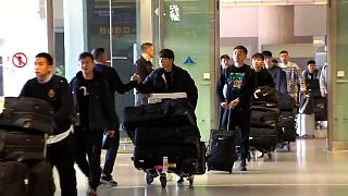 El equipo de fútbol de Wuhan a su llegada a Málaga
