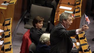 Brexit Party leader Nigel Farage waves the Union flag ahead of a vote on the UK’s withdrawal from the EU  at the European Parliament in Brussels, Wednesday, Jan. 29, 2020.  