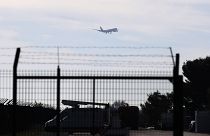 The plane carrying European passengers escaping Wuhan prepares to land at the military air base in Istres, southern France, Friday Jan.31, 2020.                   