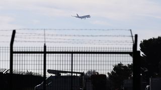 The plane carrying European passengers escaping Wuhan prepares to land at the military air base in Istres, southern France, Friday Jan.31, 2020.                   