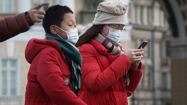 Rusya'nın St. Petersburg kentinde Çin'den gelen turistler Rusya'nın St. Petersburg kentinde Çin'den gelen turistler