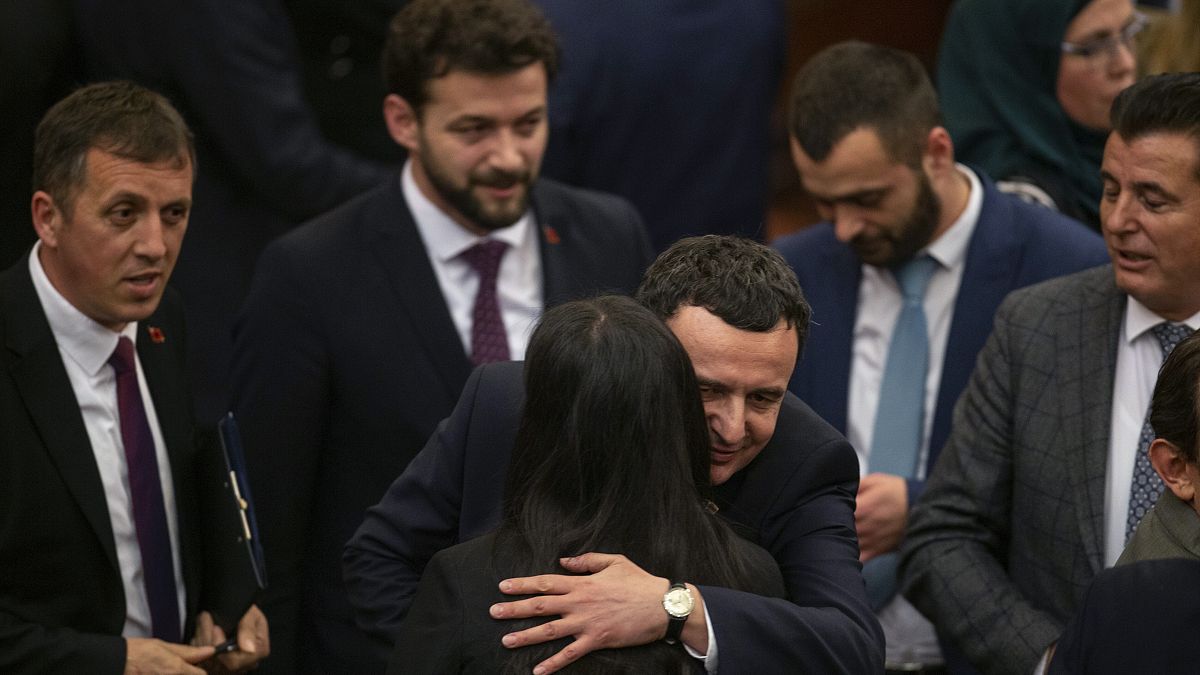 Albin Kurti, the newly elected prime minister of Kosovo is congratulated by lawmakers after the new government was elected in the capital Pristina, Monday, Feb. 3, 2020.