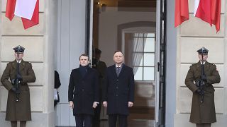 الرئيس البولندي دودا مستقبلاً ماكرون
