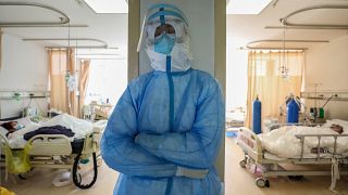 A medical staff member resting at the isolation ward of the Wuhan Red Cross Hospital in Wuhan in China's central Hubei province.