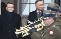 الرئيس الفرنسي إيمانويل ماكرون ونظيره البولندي أندريه دودا