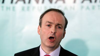 FILE - In this Wednesday, Jan. 26, 2010 file photo, leader of Fianna Fail Michael Martin speaks to the media during a press conference in Dublin, Ireland.
