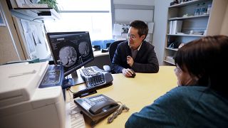 ln this  Aug. 15, 2017 photo, a patient looks at images with her doctor Shumei Kato, left, at the University of California San Diego in San Diego.