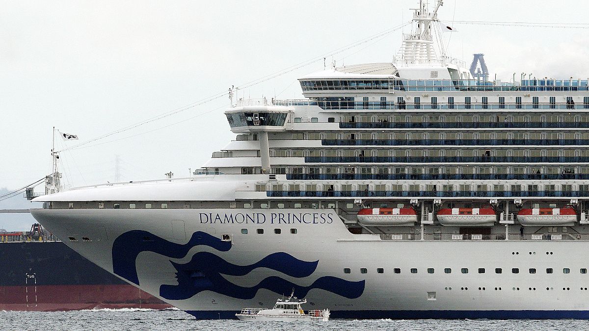Cruise ship Diamond Princess anchoring off the Yokohama Port Tuesday, Feb. 4, 2020, near Tokyo. 