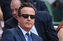 Former British Prime Minister David Cameron arrives at The All England Lawn Tennis Club in Wimbledon, southwest London, on July 6, 2018