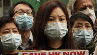 Hong Kong ile Çin arasındaki sınırın kapatılmasını talep eden Hong Konglu sağlık personeli