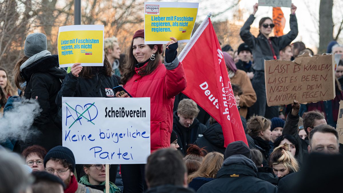 People demonstrate outside Thuringia's state parliament after the far-right AfD party helped a little-known politician into power. Erfurt, February 5, 2020.