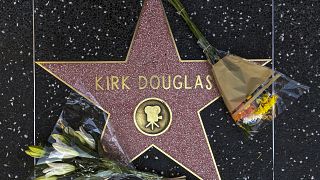 Flowers are placed on actor Kirk Douglas' start on the Hollywood Walk of Fame
