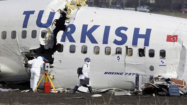 Crash investigators examine the wreckage of the Turkish airlines plane at Amsterdam's Schiphol Airport, Thursday, Feb. 26, 2009. Crash investigators examine the wreckage of the Turkish airlines plane at Amsterdam's Schiphol Airport, Thursday, Feb. 26, 2009.