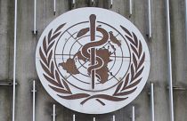 The logo of the World Health Organization (WHO) at its headquarters building in Geneva, Switzerland