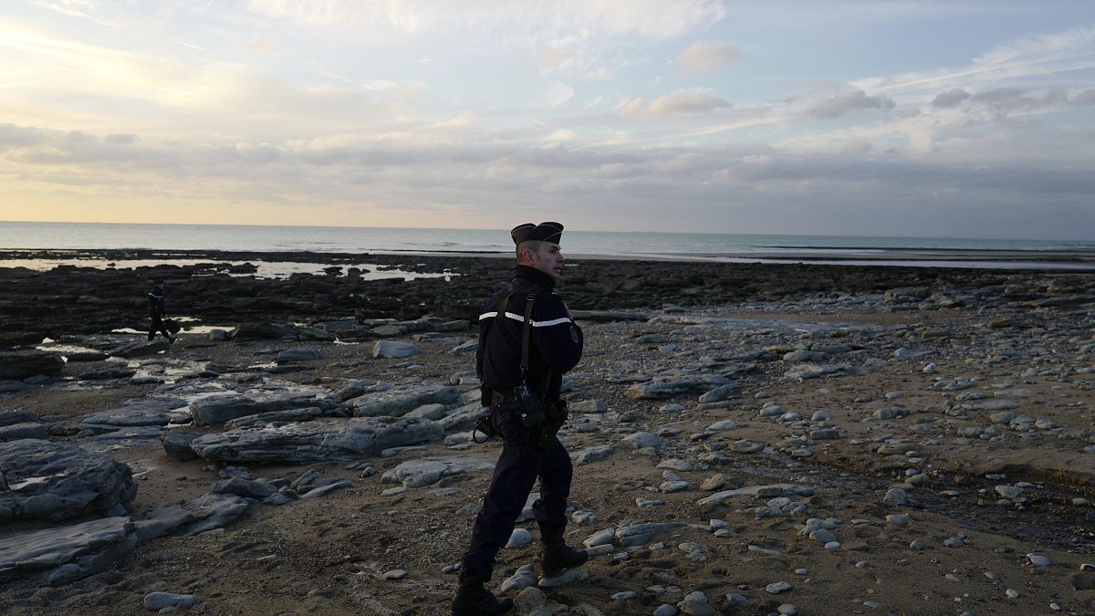 French gendarme patrols the beach in Ambleteuse near Calais, northern France.