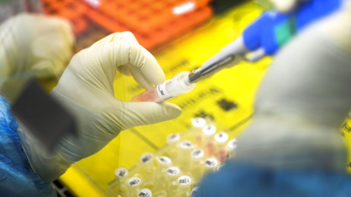 An employee works in the pop-up Huoyan Laboratory speciallized in the nucleic acid test on 2019-nCoV 