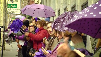 Thousands of women dye Madrid purple with human chain against violence