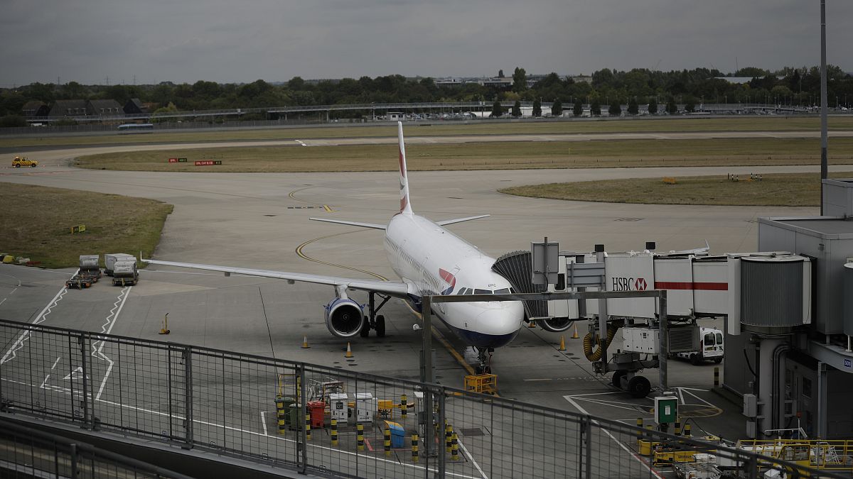 A British Airways plane sits parked at Heathrow Airport in London, Monday, Sept. 9, 2019. 