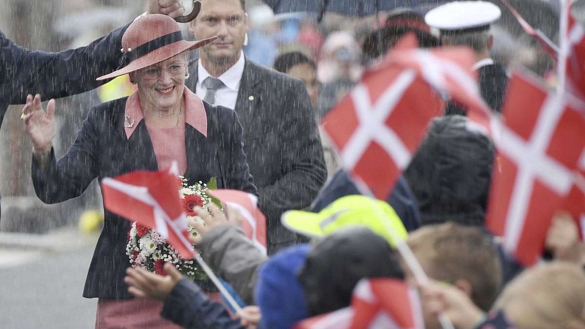 Queen Margrethe of Denmark is welcomed by students at a Danish school in Flensburg, Germany