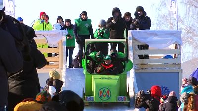 It's all downhill from here! Homemade sledge race brightens up Russian winter