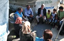 UN high commissioner for refugees Filippo Grandi speaks with Syrian refugees
