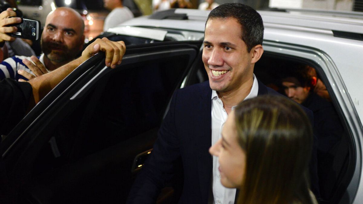 Opposition leader Juan Guaido arrives at a rally at Bolivar Plaza 