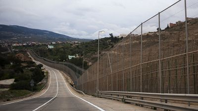 More than 200 migrants climb fence to enter Spanish enclave of Melilla