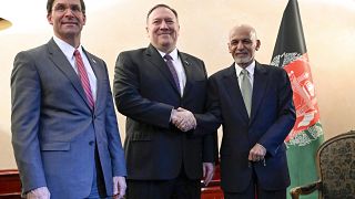 Mike Pompeo, center, with Afghan President Ashraf Ghani, right, and US Secretary of Defense Mark Esper in Munich
