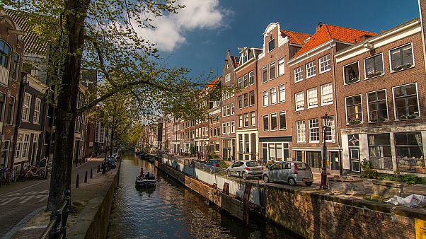 A canal in Amsterdam, Netherlands. A canal in Amsterdam, Netherlands.