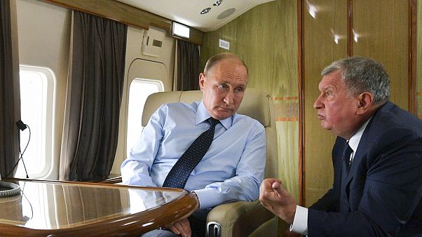 Rusya Devlet Başkanı Vladimir Putin ve Rosneft CEO'su Igor Sechin Rusya Devlet Başkanı Vladimir Putin ve Rosneft CEO'su Igor Sechin