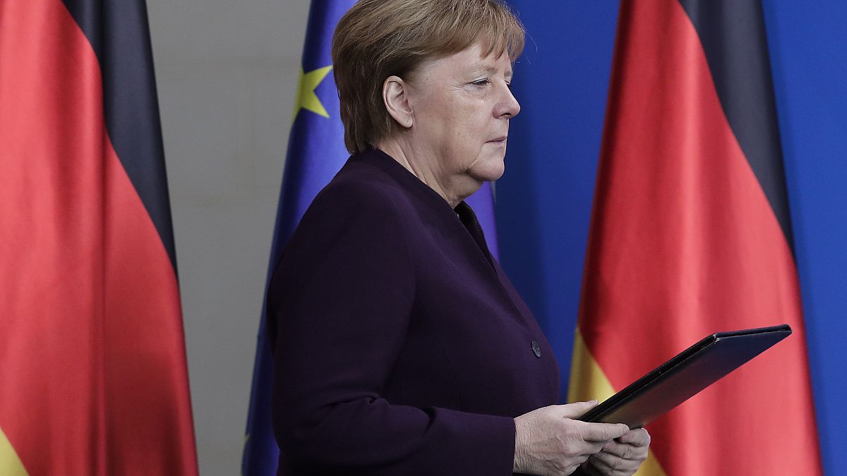 German Chancellor Angela Merkel arrives for a statement at the chancellery in Berlin, Germany, Thursday, Feb. 20, 2020. 