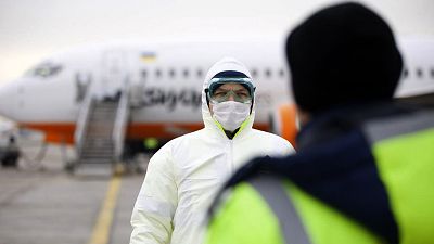 Un membre du personnel médical présidentiel ukrainien, à l'aéroport international de Borispil en Ukraine, jeudi 20 février 2020